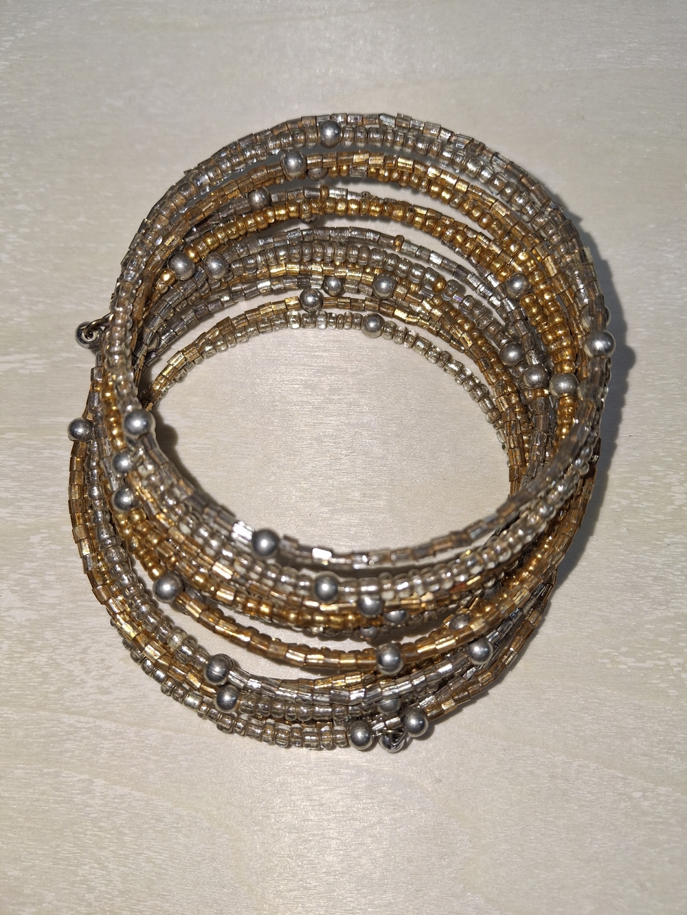Gold and Silver Beaded Coil Bracelet